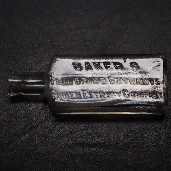 Baker's Flavoring Extracts 5" Glass Bottle Embossed Antique
